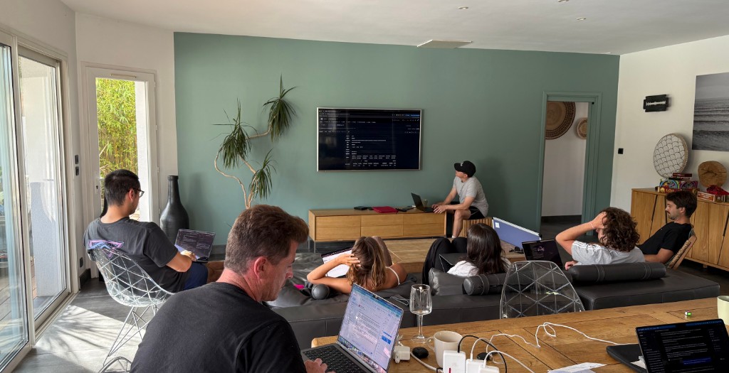 The Resizes team working together in the living room