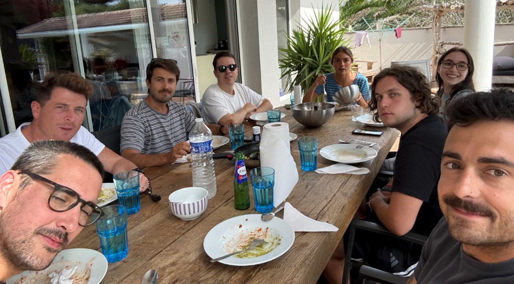 The Resizes team sharing a meal