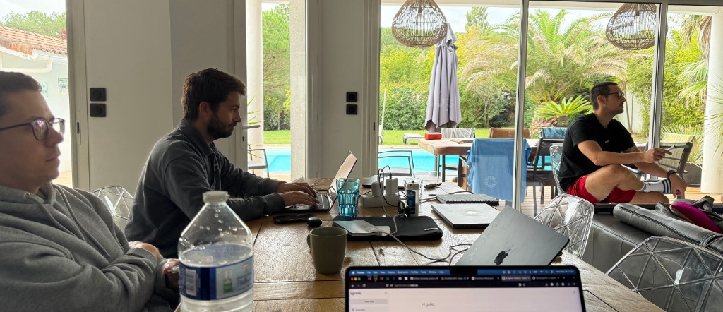 The Resizes team working at the table